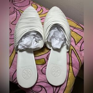 Tory Burch mules.